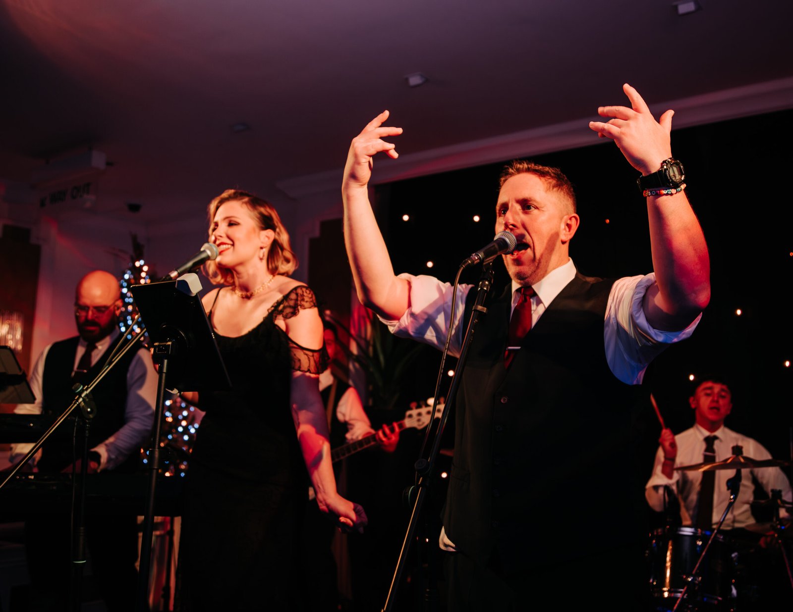 Full band shot of Surge performing live